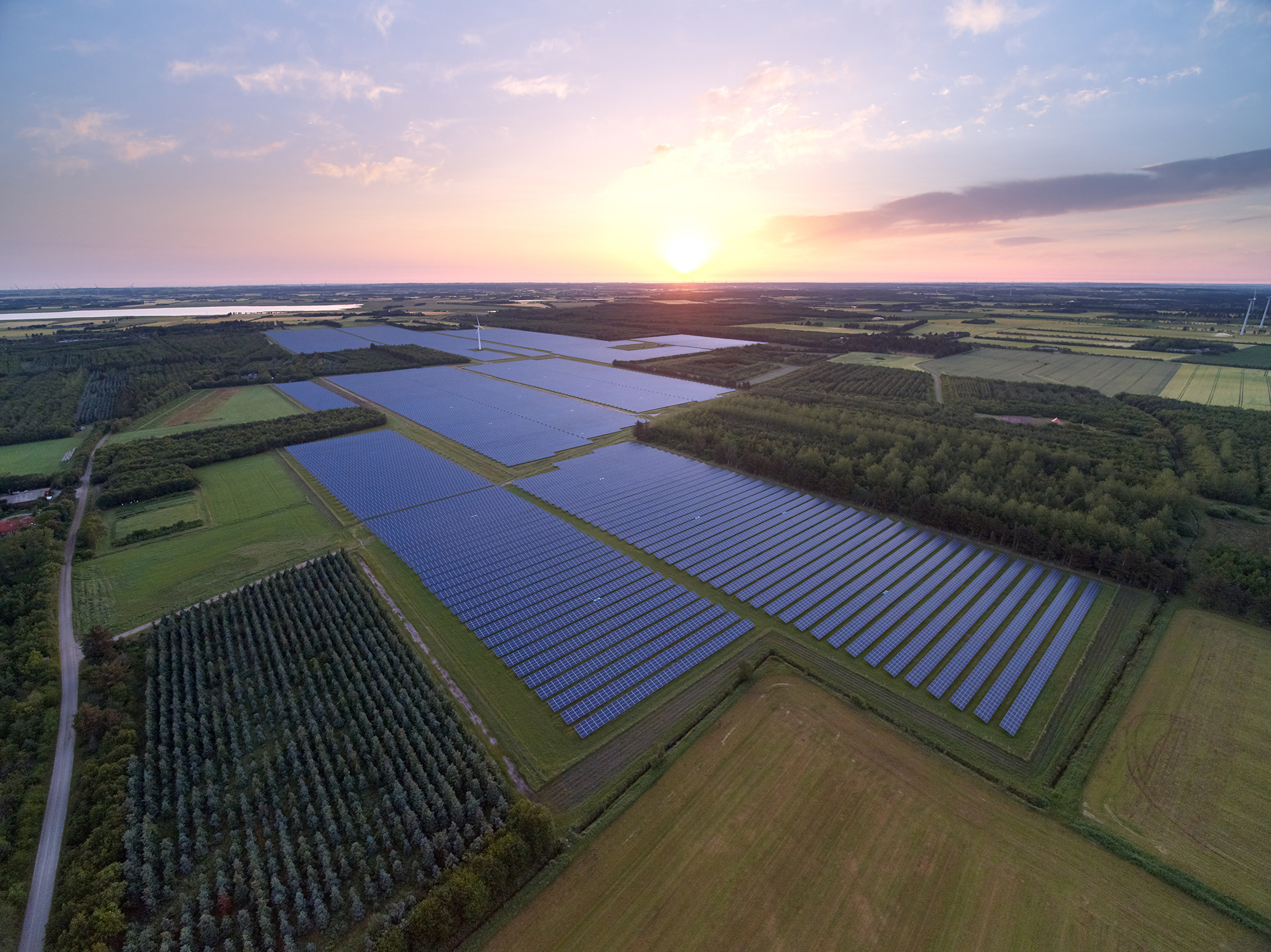 Drone image of solar park at sunset